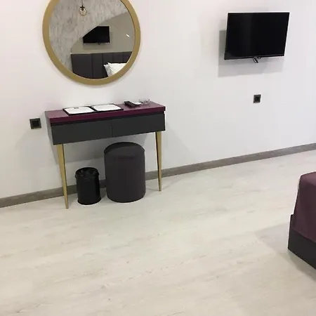 Karikatuer Bi Алания